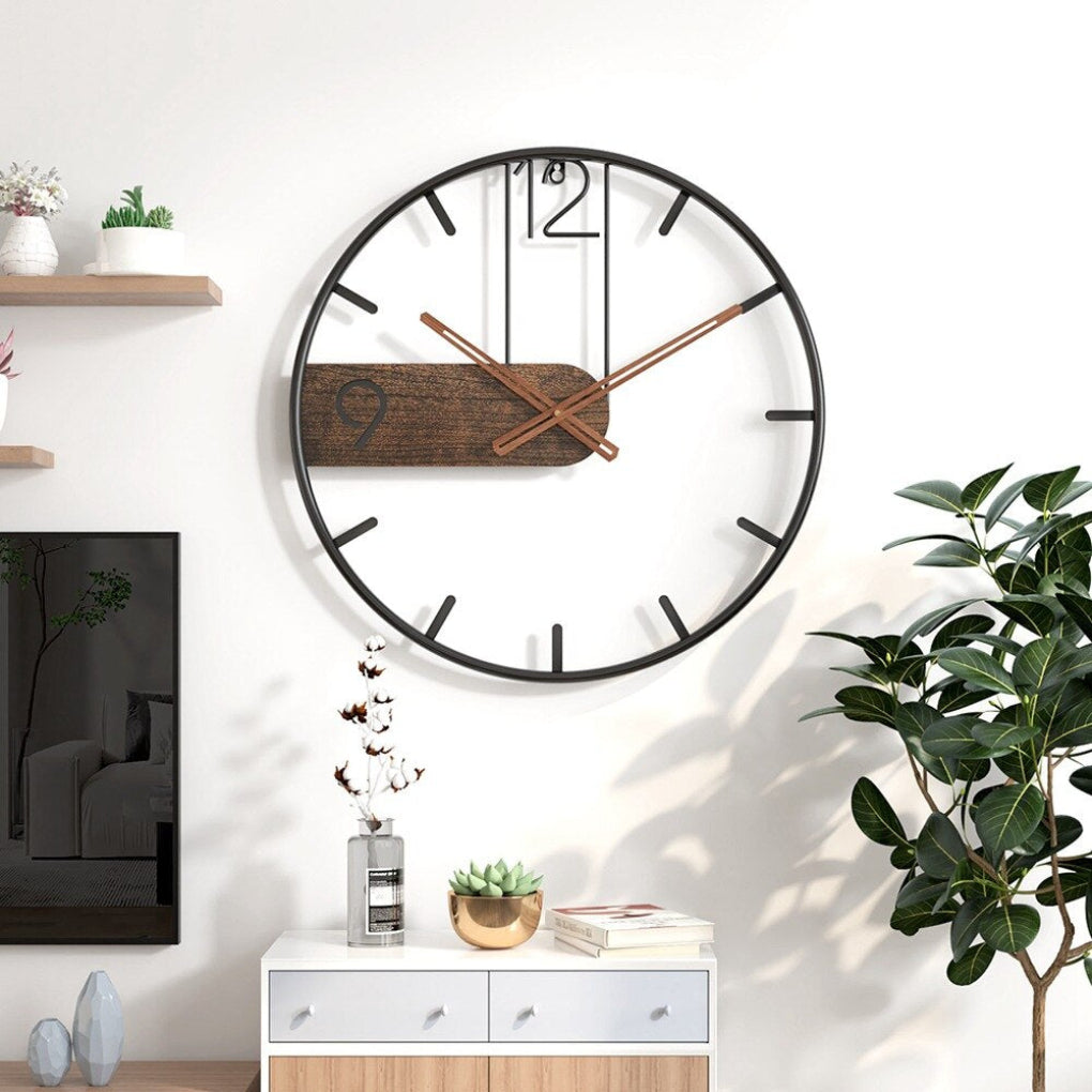 Stylish minimalist wall clock with decorative wooden accents. Silent quartz mechanism, perfect for modern home decor.