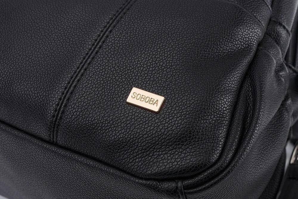 Stylish black PU leather Modern Mommy Diaper Backpack, an indispensable accessory for baby care