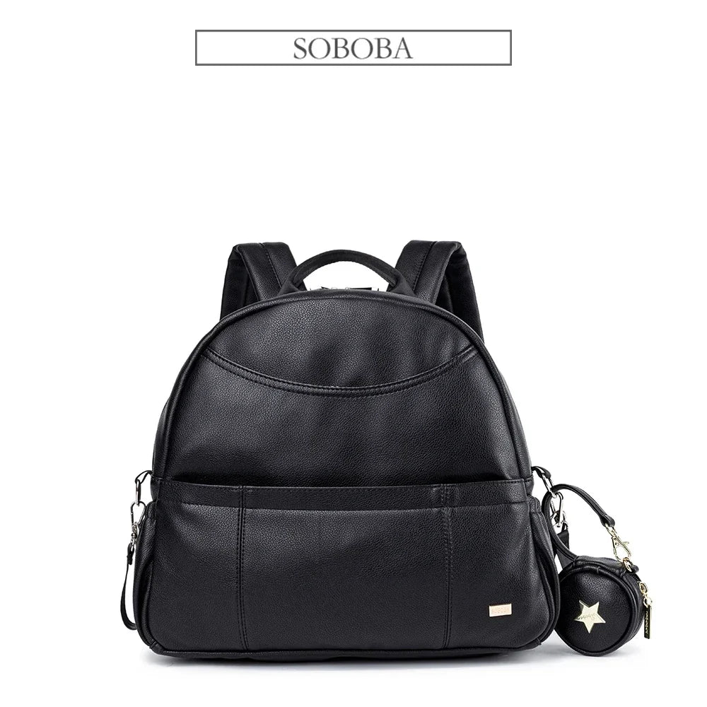 Modern Mommy Diaper Backpack, sleek black baby bag, spacious and trendy for daily outings