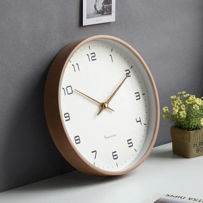 Elegant wooden wall clock, ideal for modern home or office decor. Natural wood silent clock for any room.