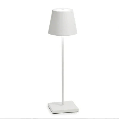 Sleek modern portable LED table lamp, dimmable and wireless. Rechargeable for contemporary home & outdoor decor.