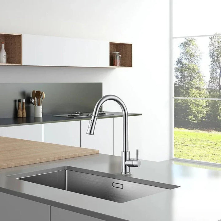 Modern smart sensor kitchen faucet with pull-out sprayer in stainless steel for a touchless experience.