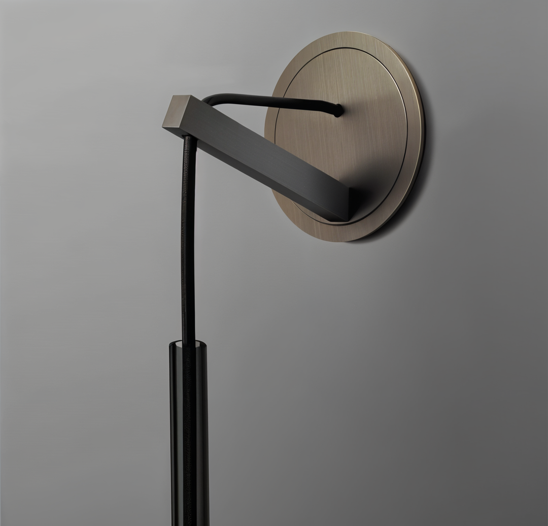 Elegant Orvane smoke glass wall lamp, perfect for modern interior design & ambient light. Minimalist decor.