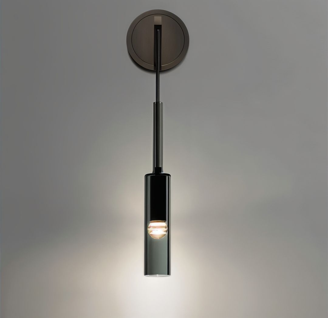 Elegant Orvane smoke glass wall lamp, modern minimalist design, adds ambient light to modern interiors.