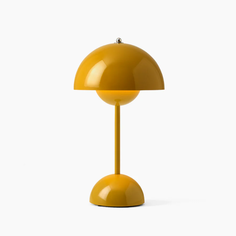 Experience modern home decor with this touch sensitive LED table lamp offering ambient light.