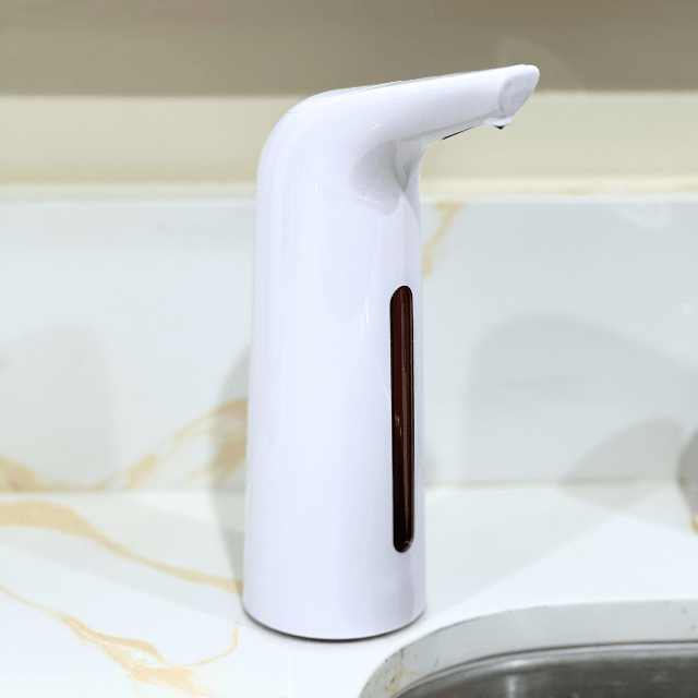 Hands-free sensor soap dispenser ensures superior hand hygiene with liquid soap; sleek design for any home.