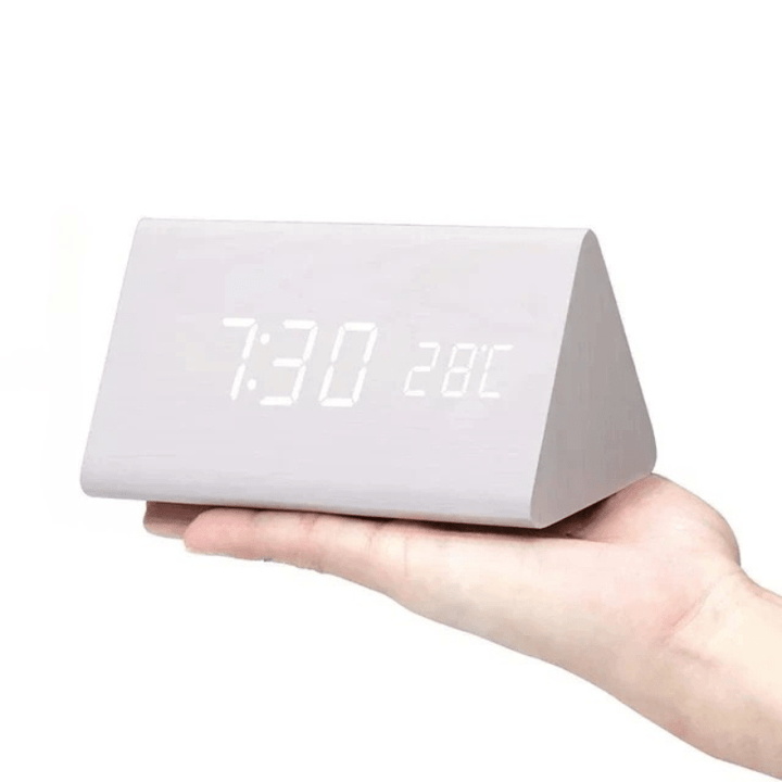 Simple, functional voice-activated LED digital alarm clock for easy timekeeping & modern decor.