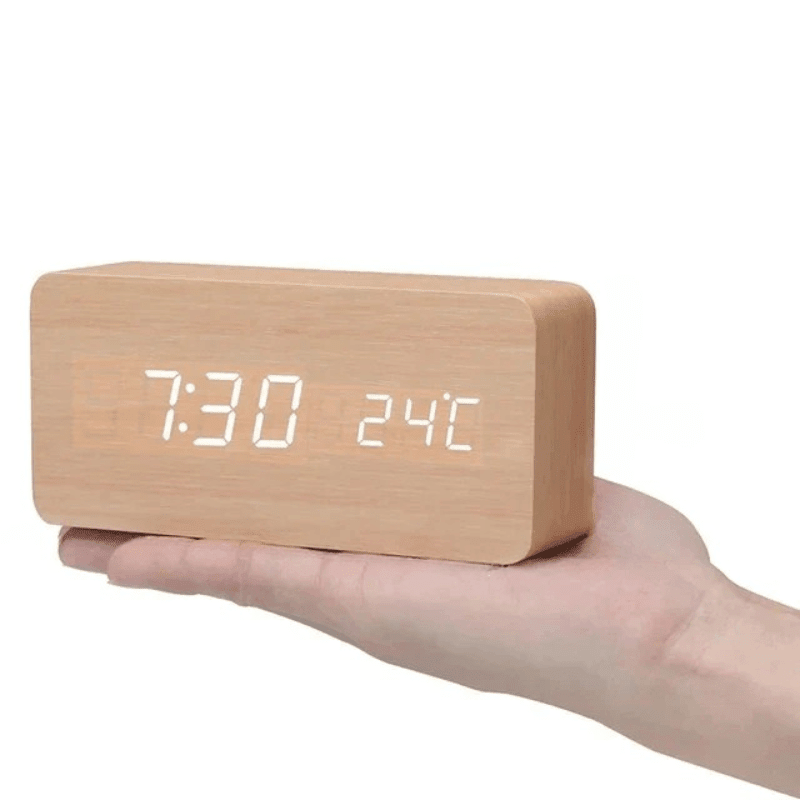 USB-powered voice-activated LED digital table clock with a modern, clear LED display for convenience.