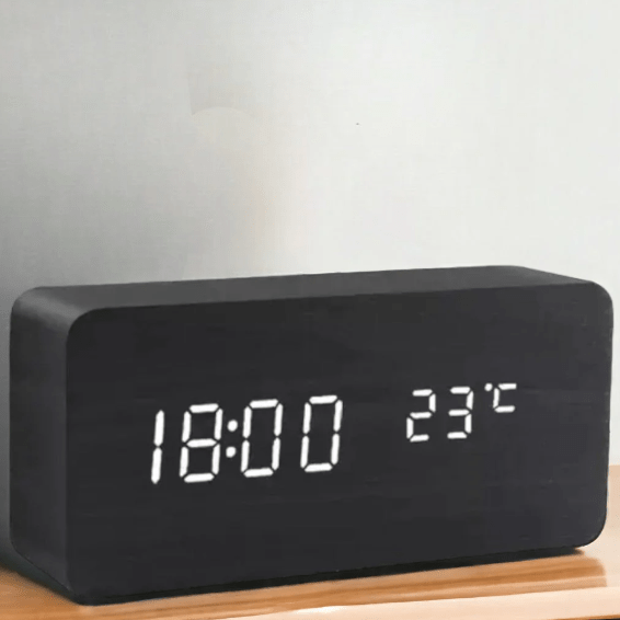 Sleek LED digital table clock with voice control. Ideal for modern office desks or bedside tables.