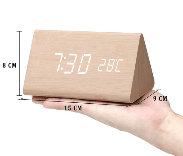 Minimalist LED digital clock, voice-activated for a clean, smart home decor look on any surface.