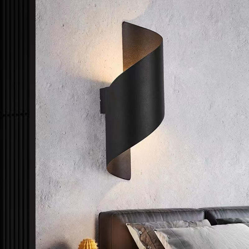 Contemporary spiral LED wall lamp, a chic and energy-saving sconce for modern decor.