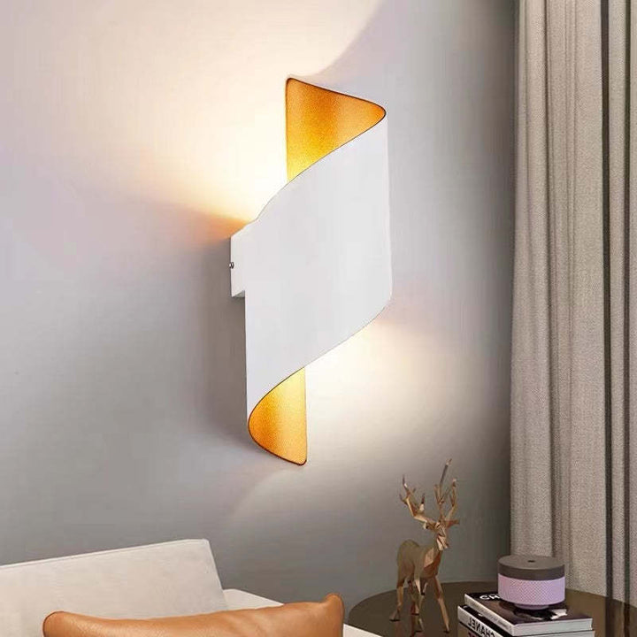 Create a modern ambiance with this spiral LED wall sconce, versatile indoor/outdoor lighting.