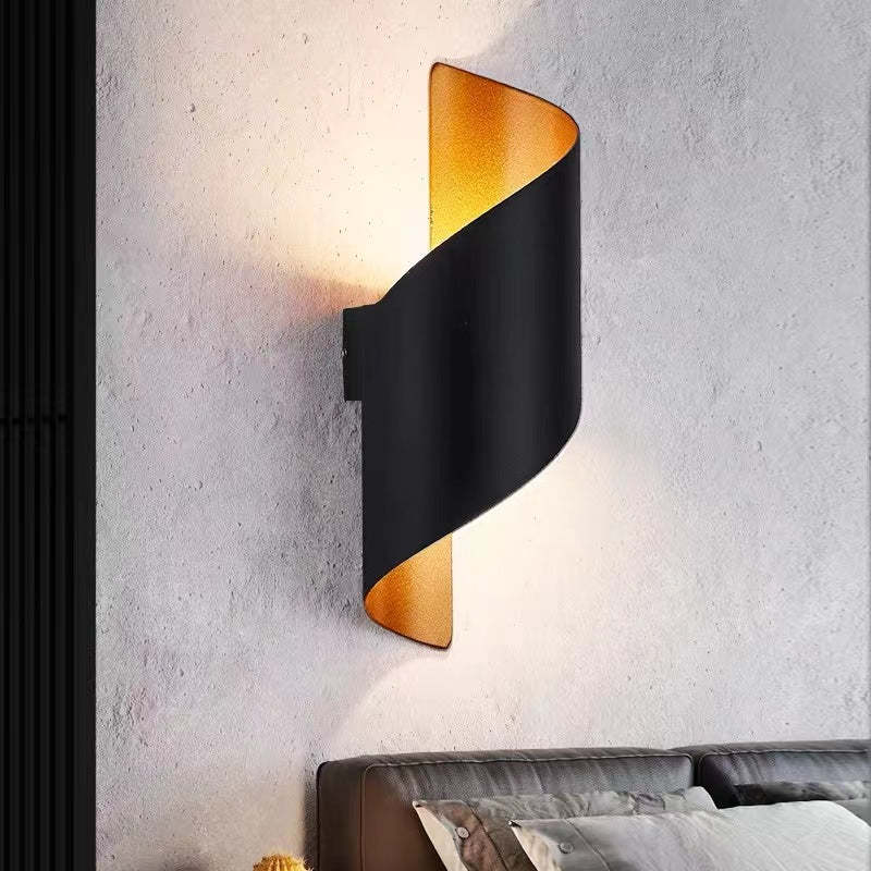 Modern spiral LED wall light fixture, offering stylish and energy-efficient illumination.