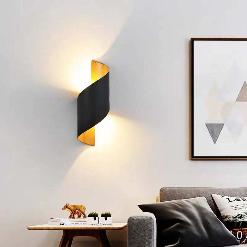 Energy-efficient modern spiral LED wall sconce, adds contemporary flair to any space.