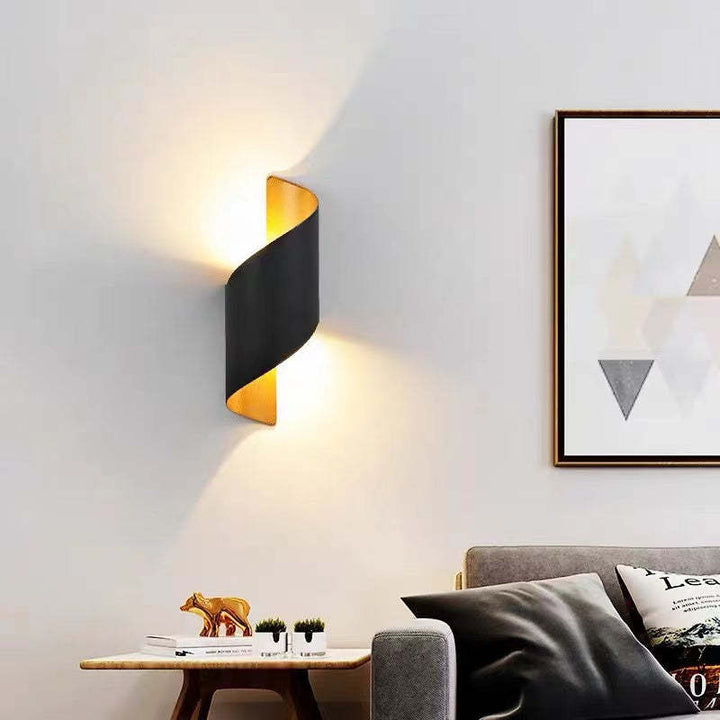 Energy-efficient modern spiral LED wall sconce, adds contemporary flair to any space.