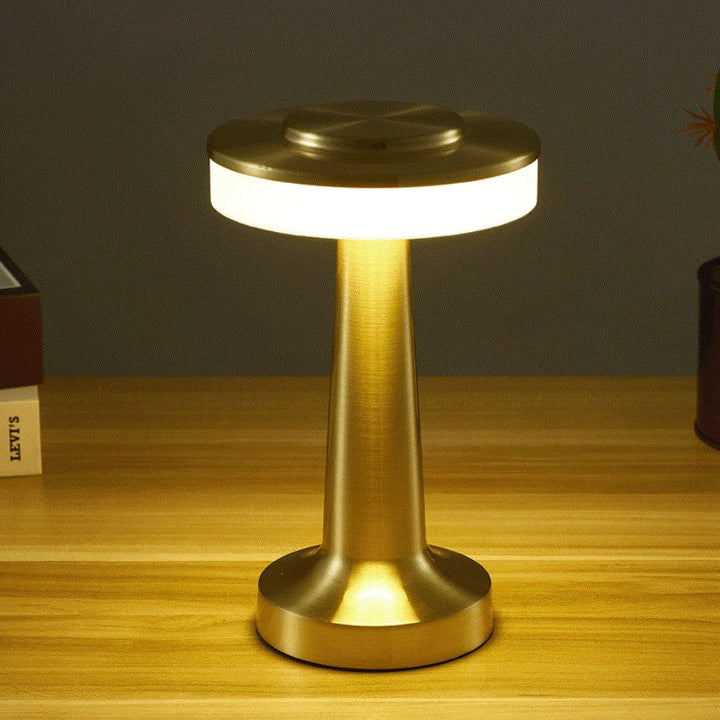 Modern wireless LED table lamp, portable & dimmable. Rechargeable USB lamp for home decor accent lighting.