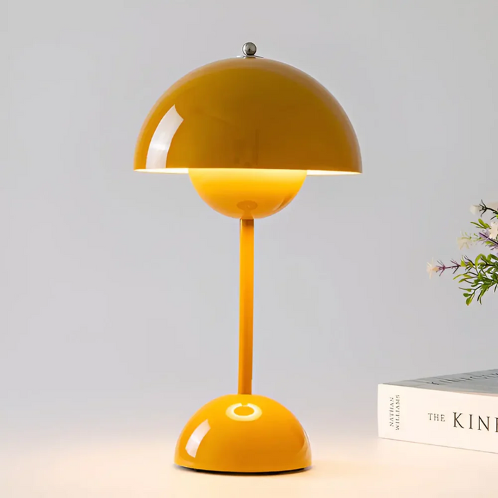 Energy-efficient rechargeable wireless LED table lamp, modern design for a warm home ambiance.