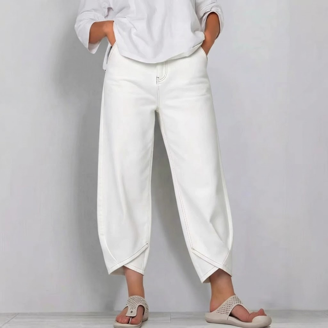Versatile women's barrel leg cropped jeans. Mid-rise, relaxed modern fit denim for comfortable, stylish casual wear.