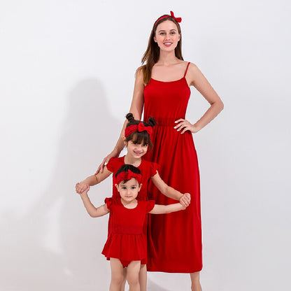 Matching mommy and me strapless red dresses in cotton, ideal for summer outfits and family fashion.