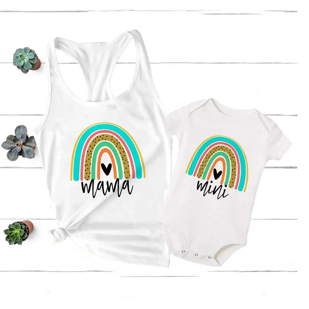 Unisex baby rainbow outfit matching mom's colorful top, ideal for summer, comfortable fabric.