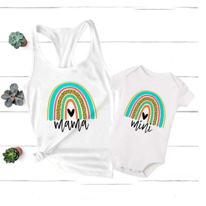 Unisex baby rainbow outfit matching mom's colorful top, ideal for summer, comfortable fabric.