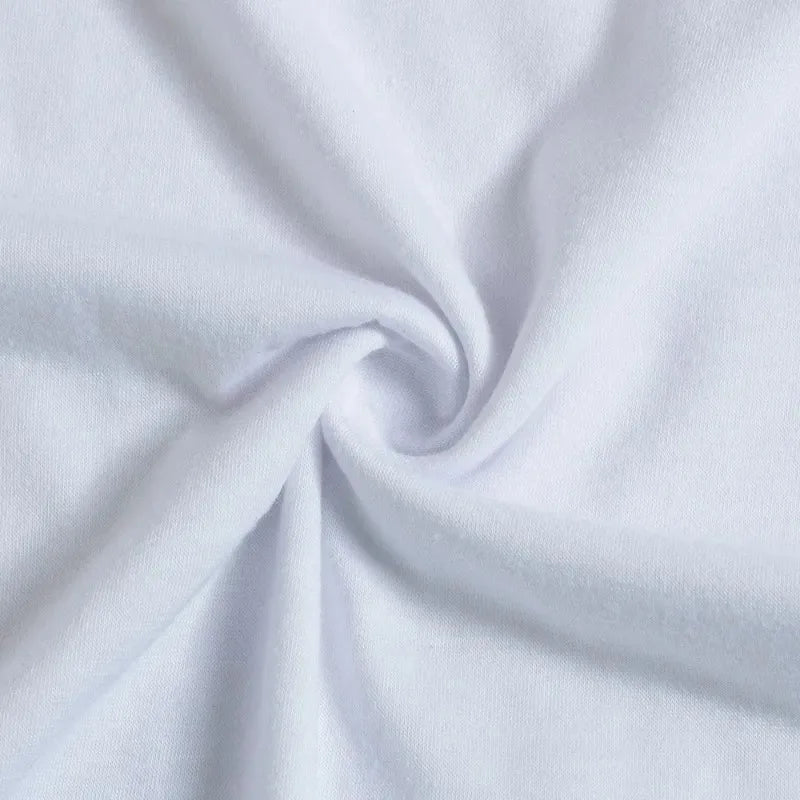Close-up of mom's white 'ONE' birthday t-shirt, part of a family matching first birthday set