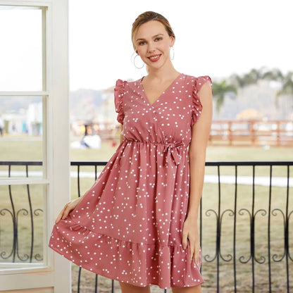 Girls' fashion: vibrant pink dotted cross wrap dress, a must-have for summer outfits