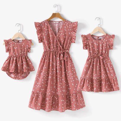 Mom and me dresses: stylish pink dotted cross wrap dresses for a coordinated look