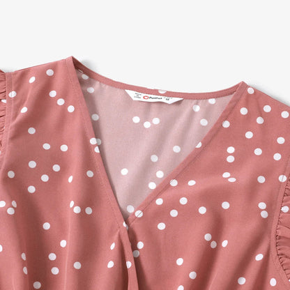 Girls' pink dotted dress with a comfortable elastic waistband and flared skirt
