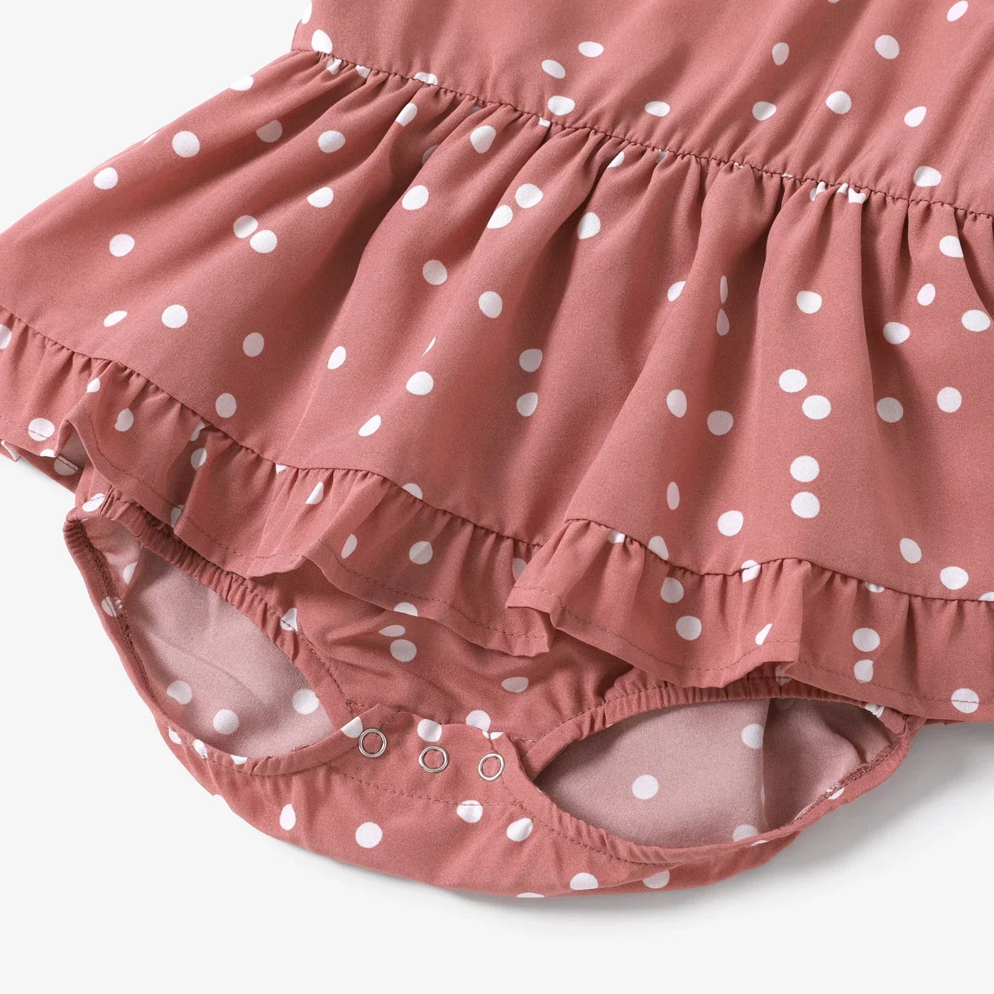 Versatile pink dotted cross wrap dress suitable for women and girls, a chic summer staple