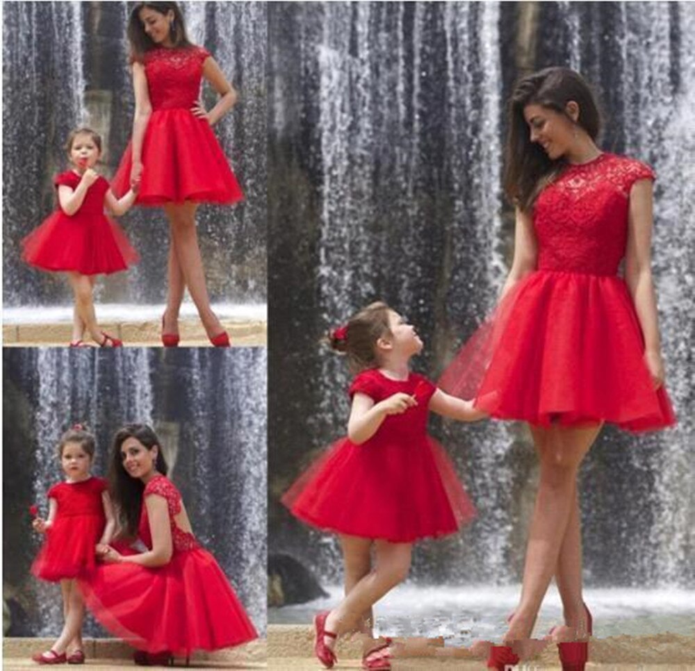 Mother daughter matching red lace and tulle party dresses, ideal for festive events and special gatherings