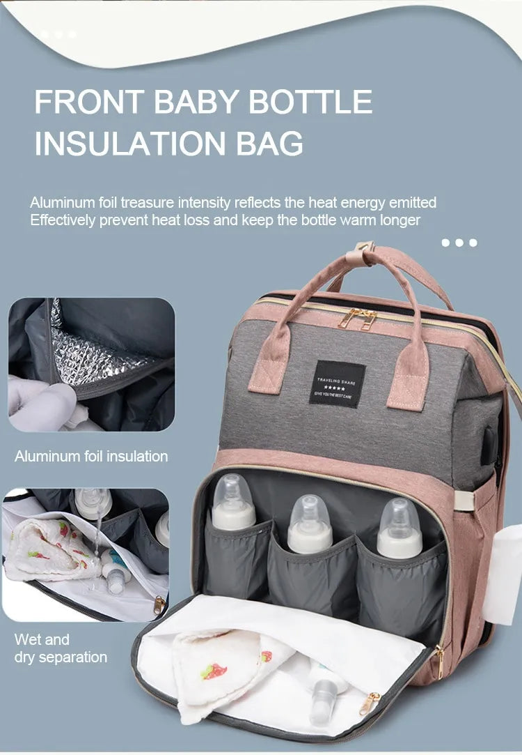 Mom's waterproof diaper backpack with built-in USB charging port for convenience