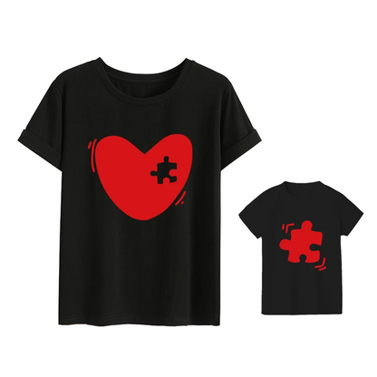 Assortment of family matching print t-shirts in various sizes, cotton short sleeve tees