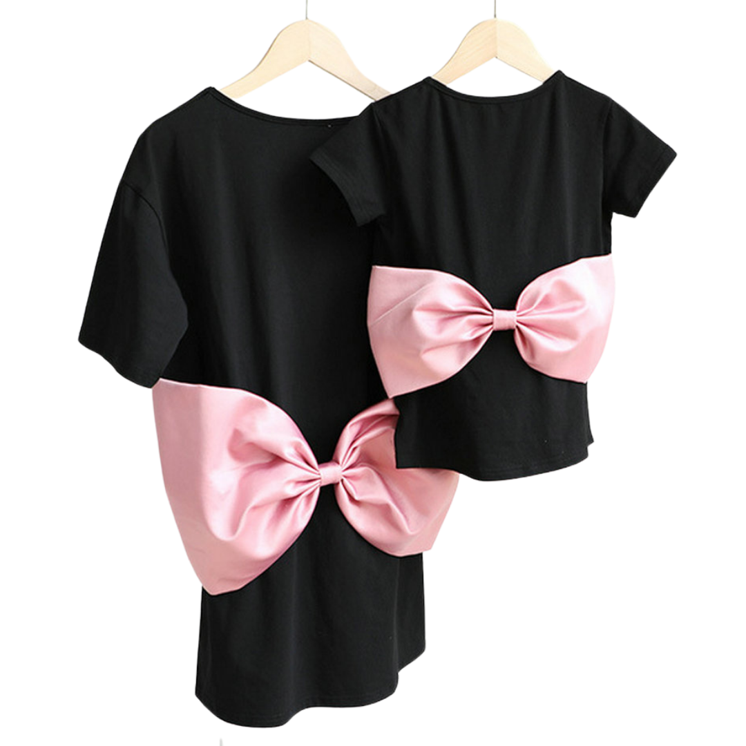 Mommy and me matching pink big bow tee dress set for casual summer outings, shown on a baby girl and woman.