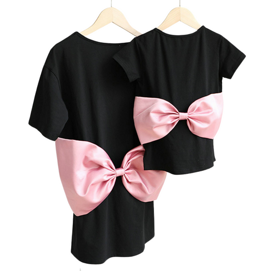Mommy and me matching pink big bow tee dress set for casual summer outings, shown on a baby girl and woman.