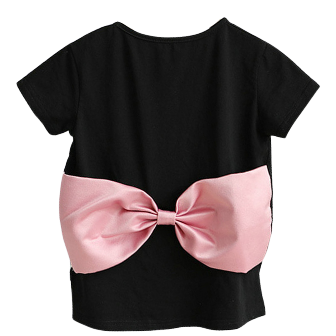 Close-up of a pink baby girl's dress with a big bow, part of a mommy and me matching outfit set.