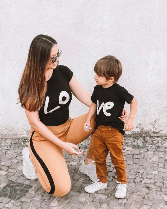 Mother and child wearing pink love print T-shirts, perfect polyester summer matching outfits.