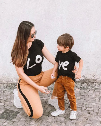 Mother and child wearing pink love print T-shirts, perfect polyester summer matching outfits.