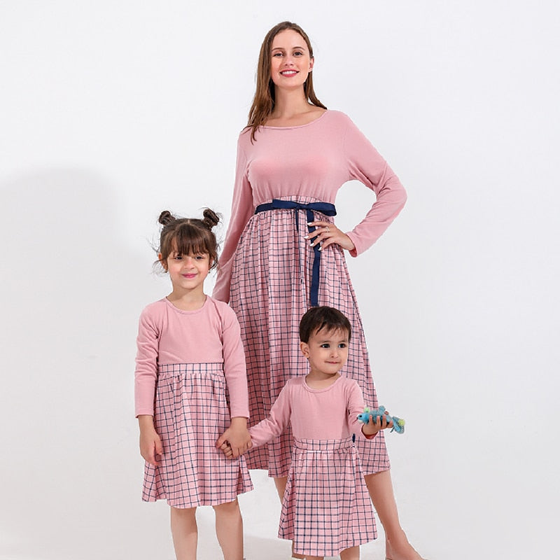 Mommy, daughter & baby in cheerful yellow floral matching cotton dresses, family outfits for summer