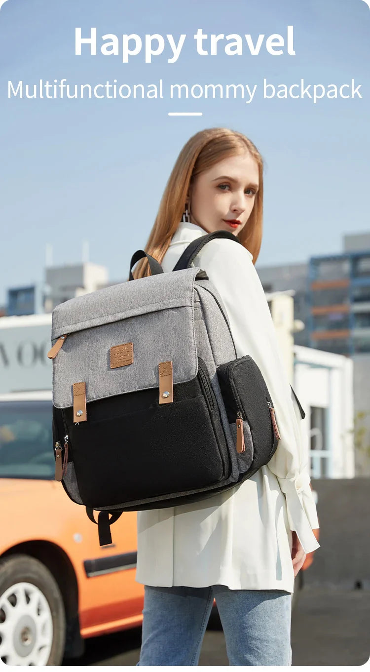 Compact mommy bag with changing mat, easy to carry for short trips