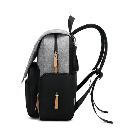 Large capacity diaper backpack with stroller straps and insulated bottle pockets