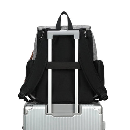 Black mommy diaper backpack with wide opening and included changing pad