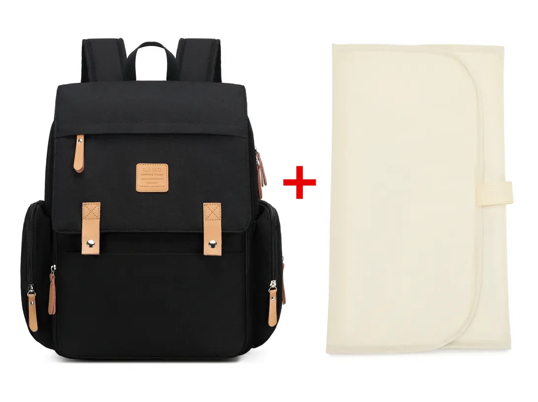 Designer diaper backpack, includes a matching changing mat for baby care