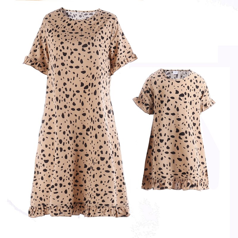 Matching leopard dresses, women's & girls' styles, perfect for a family photoshoot or event.