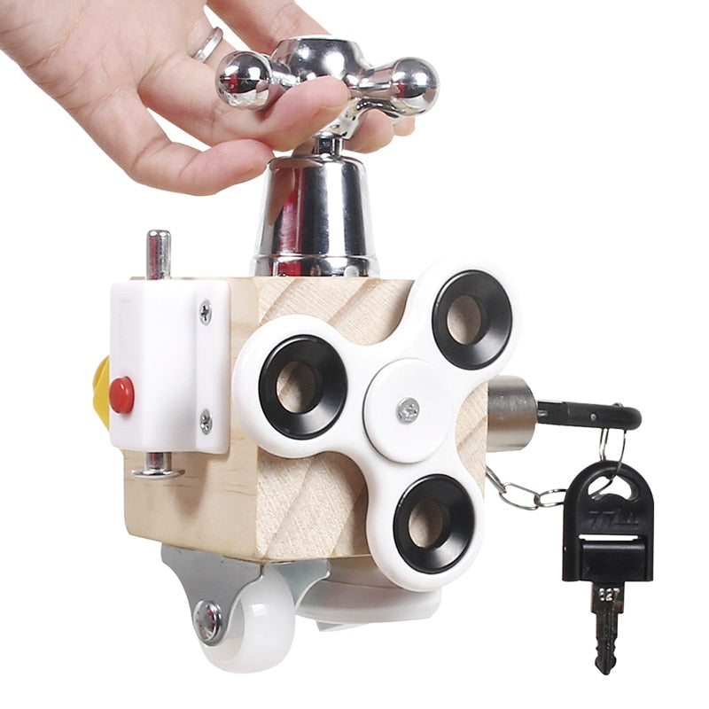 Wooden sensory busy cube, a developmental travel toy for young children's activity.