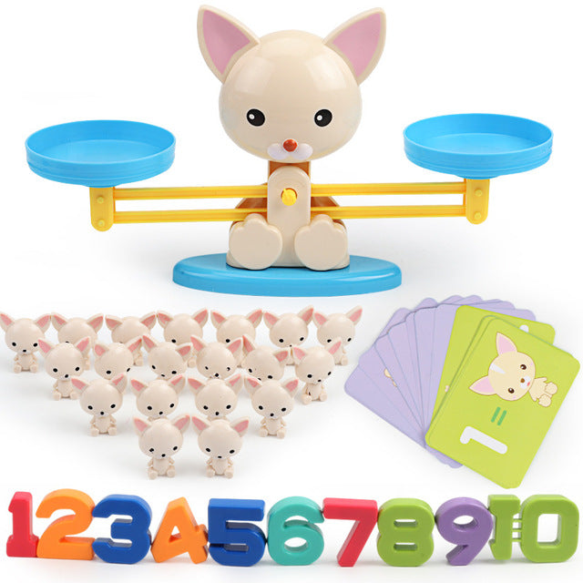 Close-up of a math balance game with weights, teaching kids elementary math concepts
