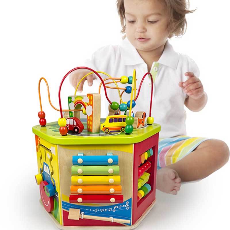 Montessori wooden 5-in-1 activity cube for toddlers with bead maze, gears, and shape sorter, promoting motor skills