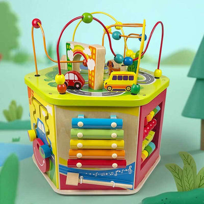 Close-up of wooden activity cube's bead maze, bright colors and smooth beads for educational toddler play