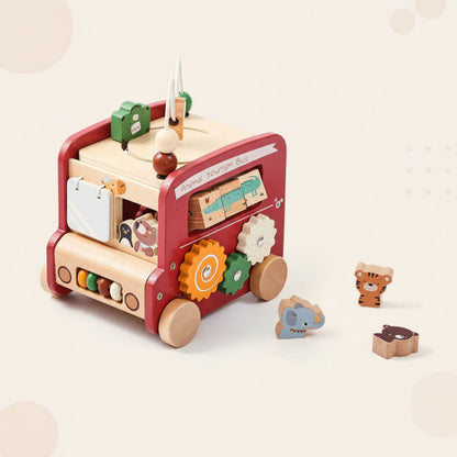 Sustainable wooden montessori activity bus, a fun and enriching toy for young learners.