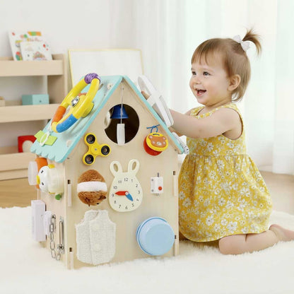 Close-up of a gear mechanism on a wooden sensory busy house, perfect for toddler fine motor skills.